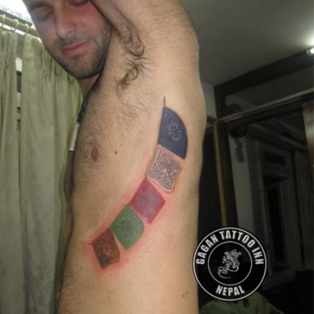 buddhist flag tattoo
